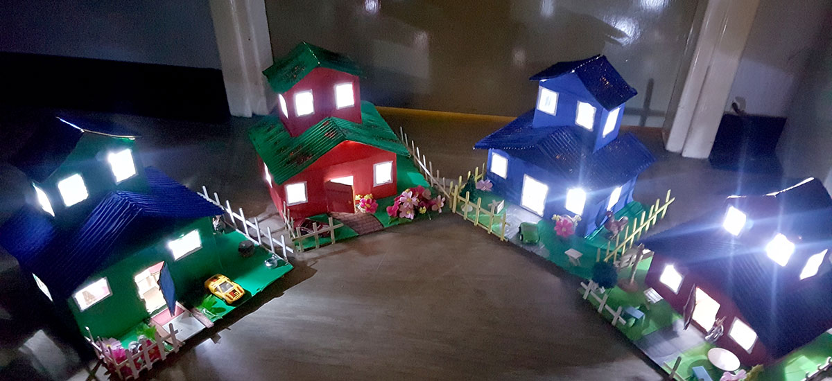 cardboard houses lit by battery