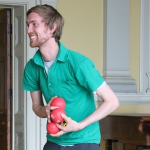 A volunteer carrying boccia balls at the Royal Hospital for Neuro-disability