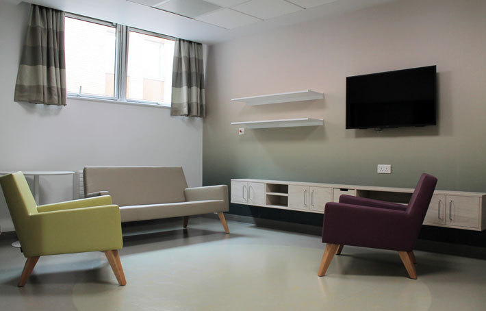 A modern communal room for patients in a hospital