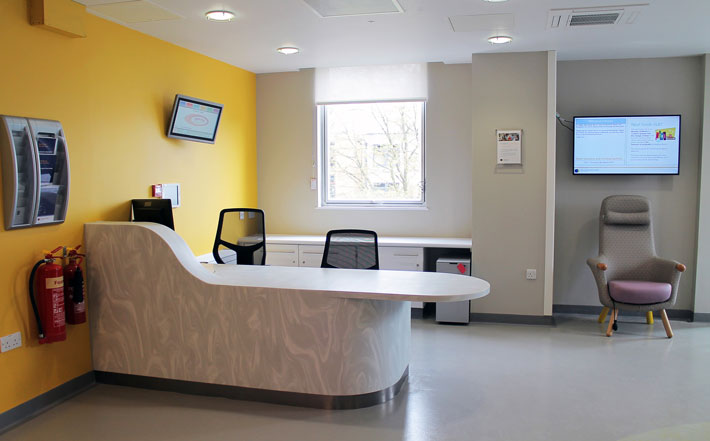 A modern reception desk on a hospital ward