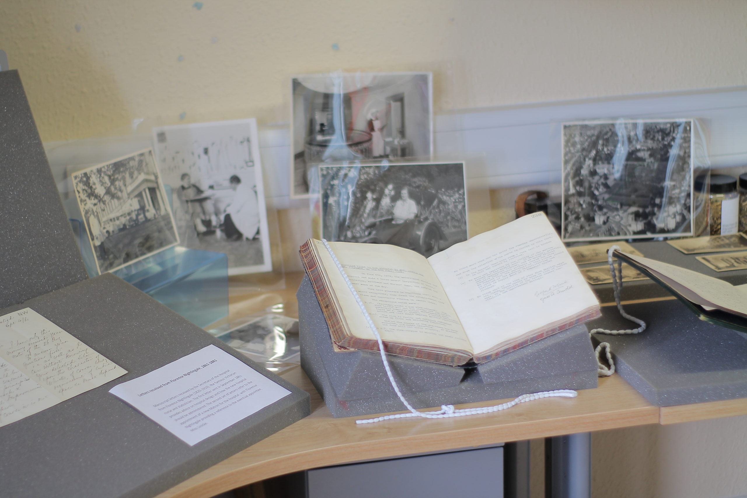 Archive books and pages on a desk