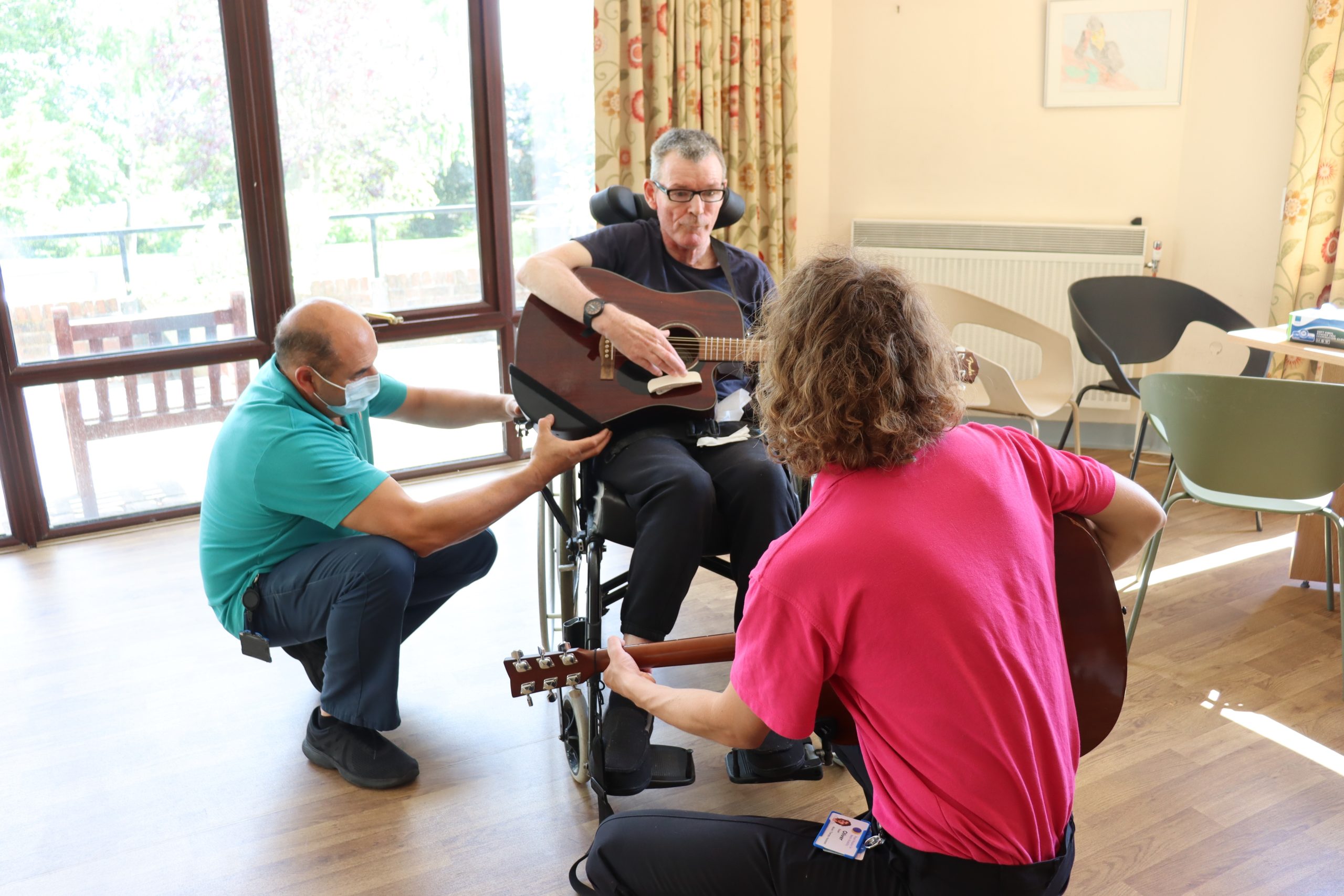 RHN XMAS APPEAL - Music therapy assistant Oli and Alberto with Nick